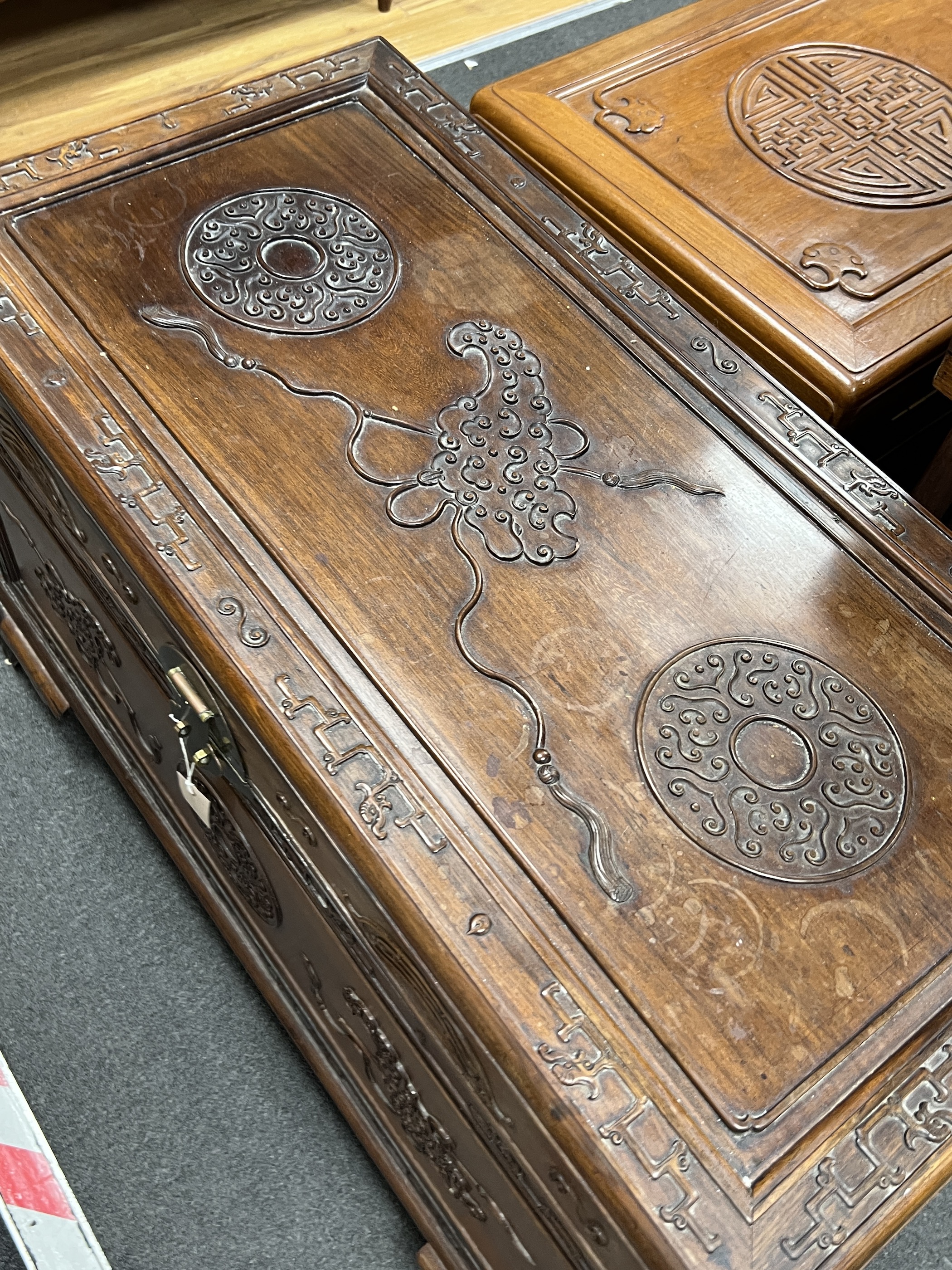 An Asian carved camphorwood trunk, width 100cm, depth 49cm, height 64cm